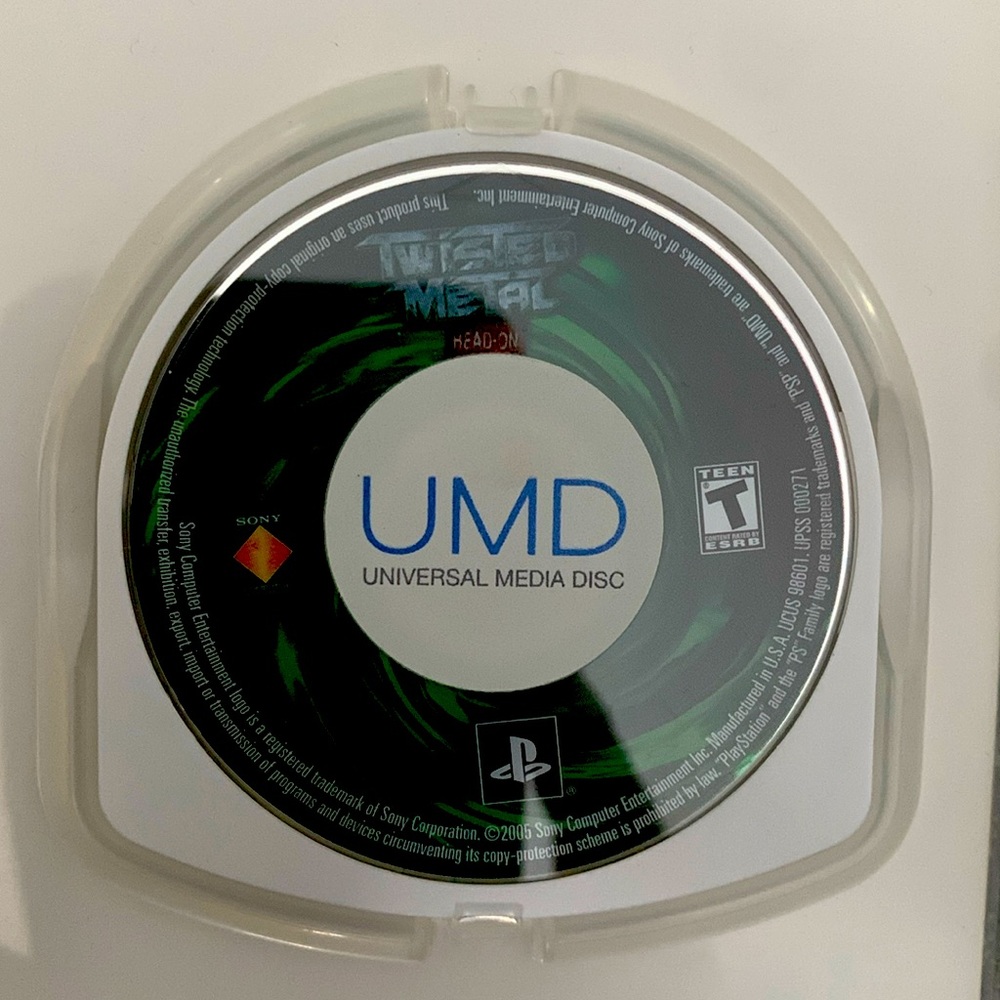 Twisted Metal Head On PlayStation PSP game disk.
